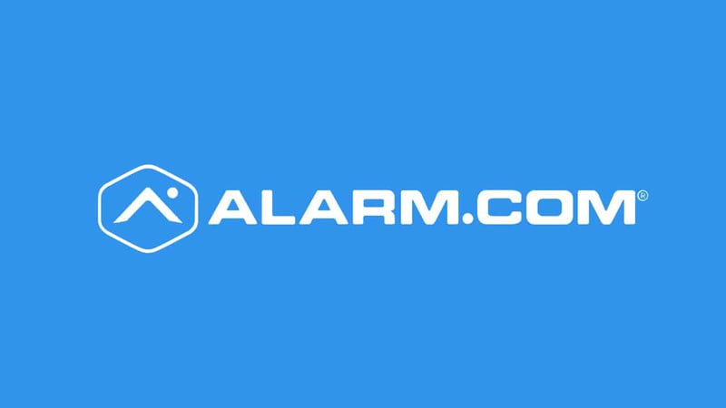 White Alarm.com logo on a blue background. White Alarm.com logo on a blue background.