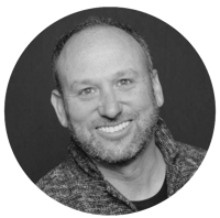 Black and white headshot photo of Josh Levine.